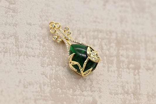 Vintage Green Gem Brooch with Floral Accents