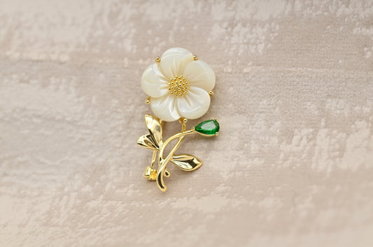 Mother-of-Pearl Flower Brooch with Green Gemstone Accent