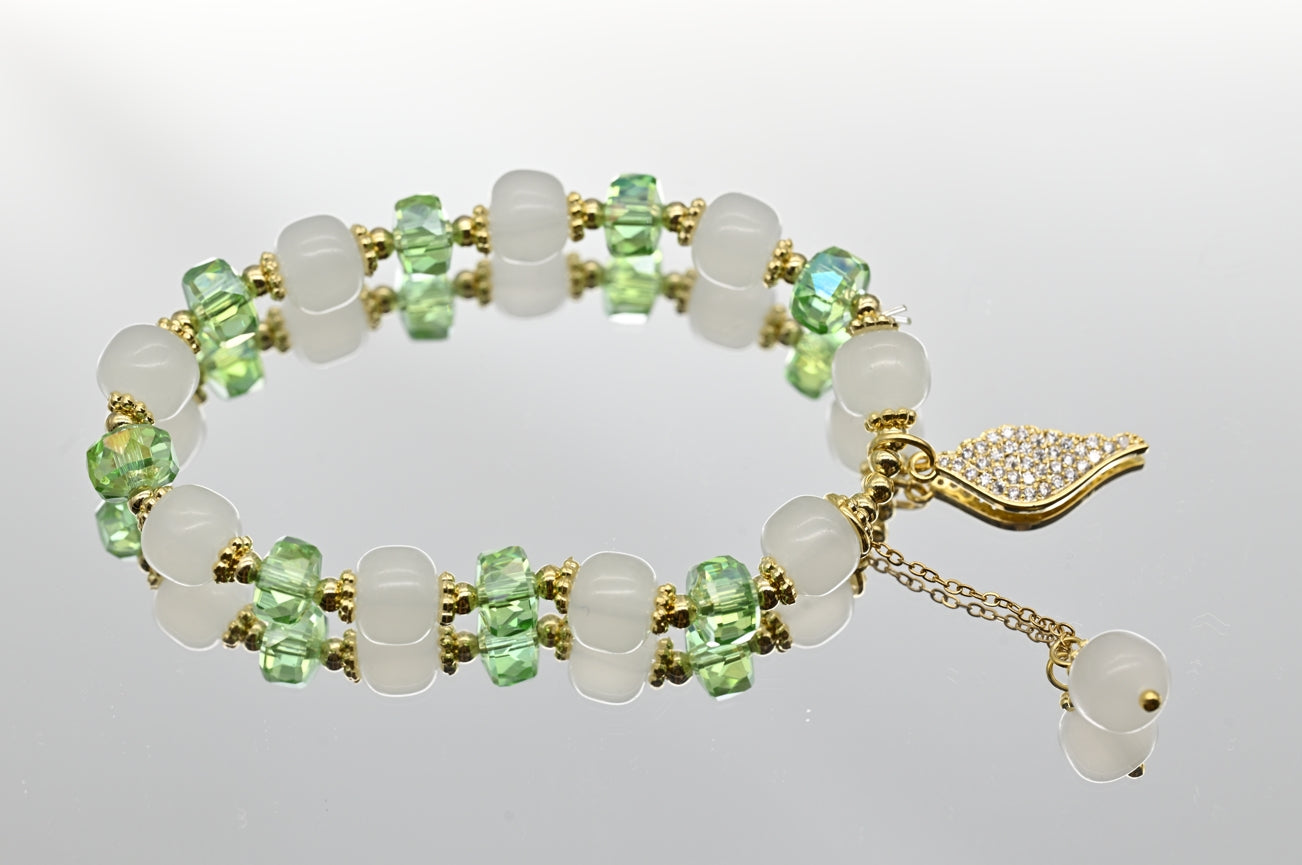Green and White Beaded Bracelet with Gold Accents