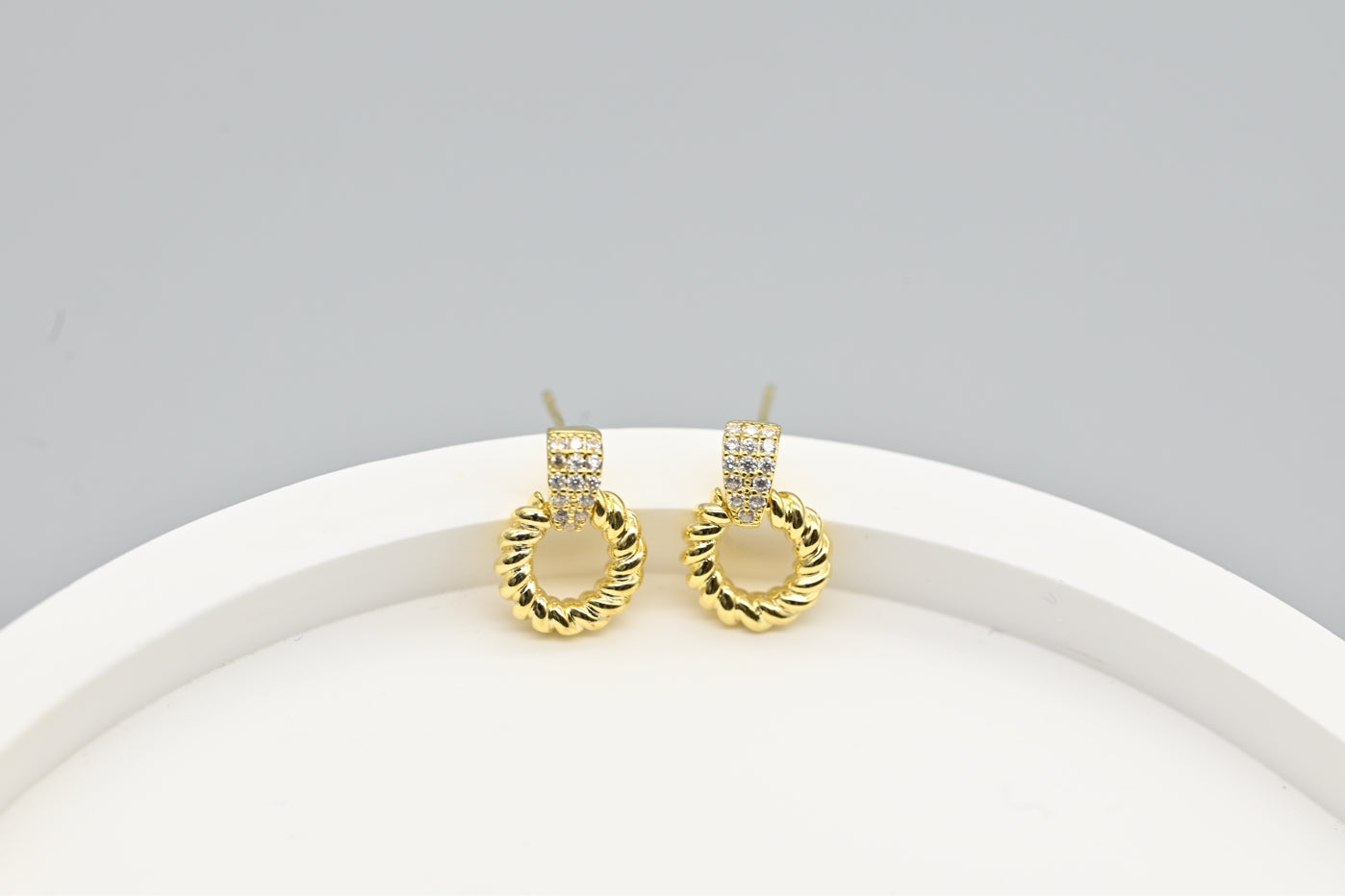 Chic Gold-Plated Twisted Hoop Earrings with Cubic Zirconia