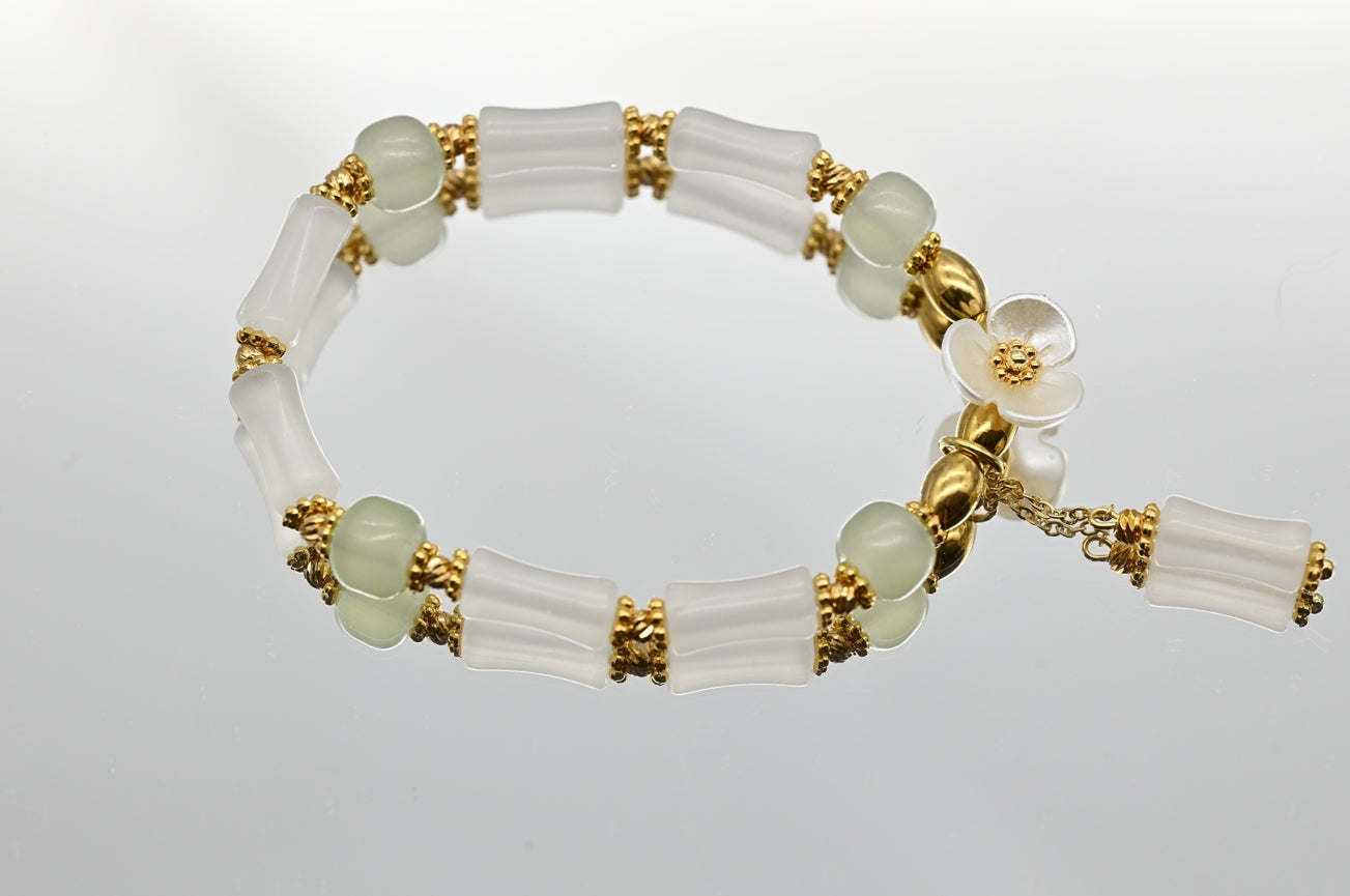 White and Green Beaded Bracelet with Flower Charm