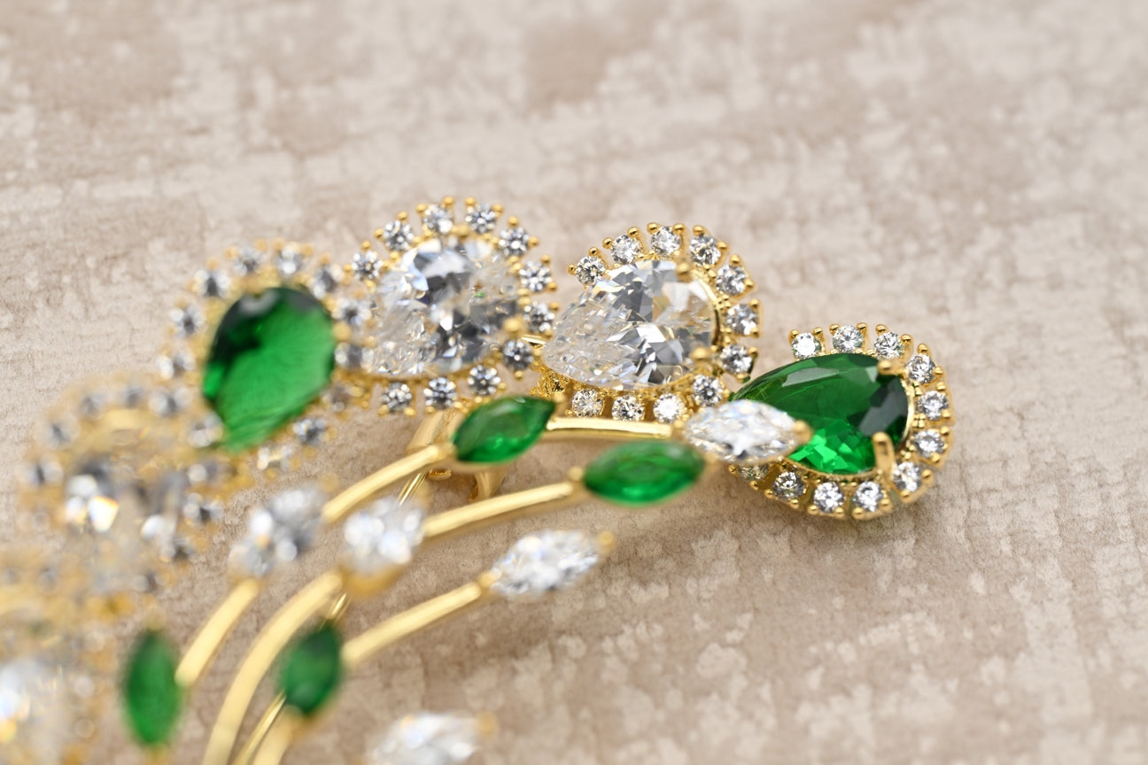 Radiant Emerald and Diamond Cluster Brooch in Gold