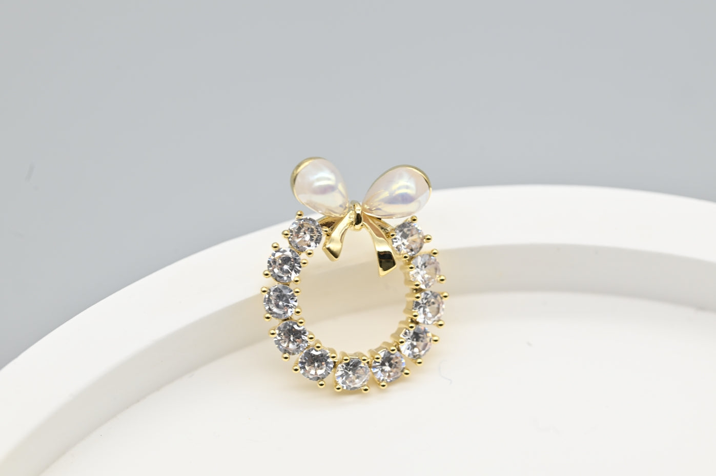 Bow and Circle Stud Earrings with Faux Pearls