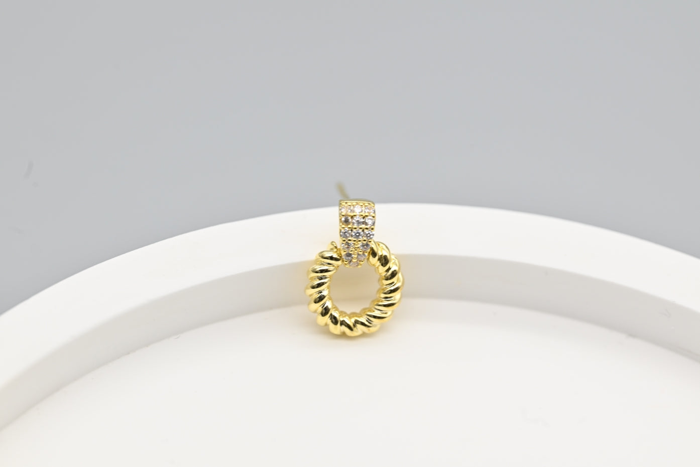 Chic Gold-Plated Twisted Hoop Earrings with Cubic Zirconia