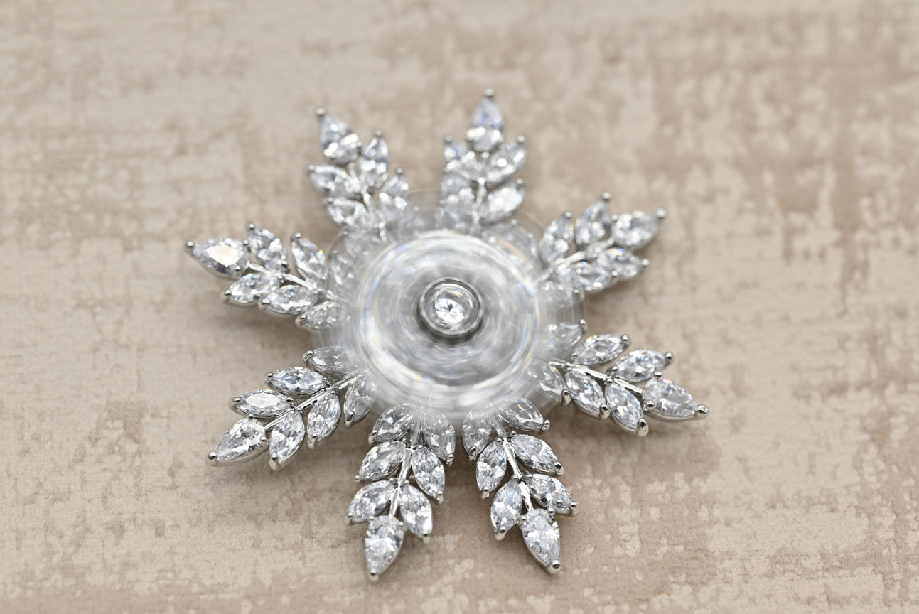 Elegant Snowflake Crystal Brooch in Silver