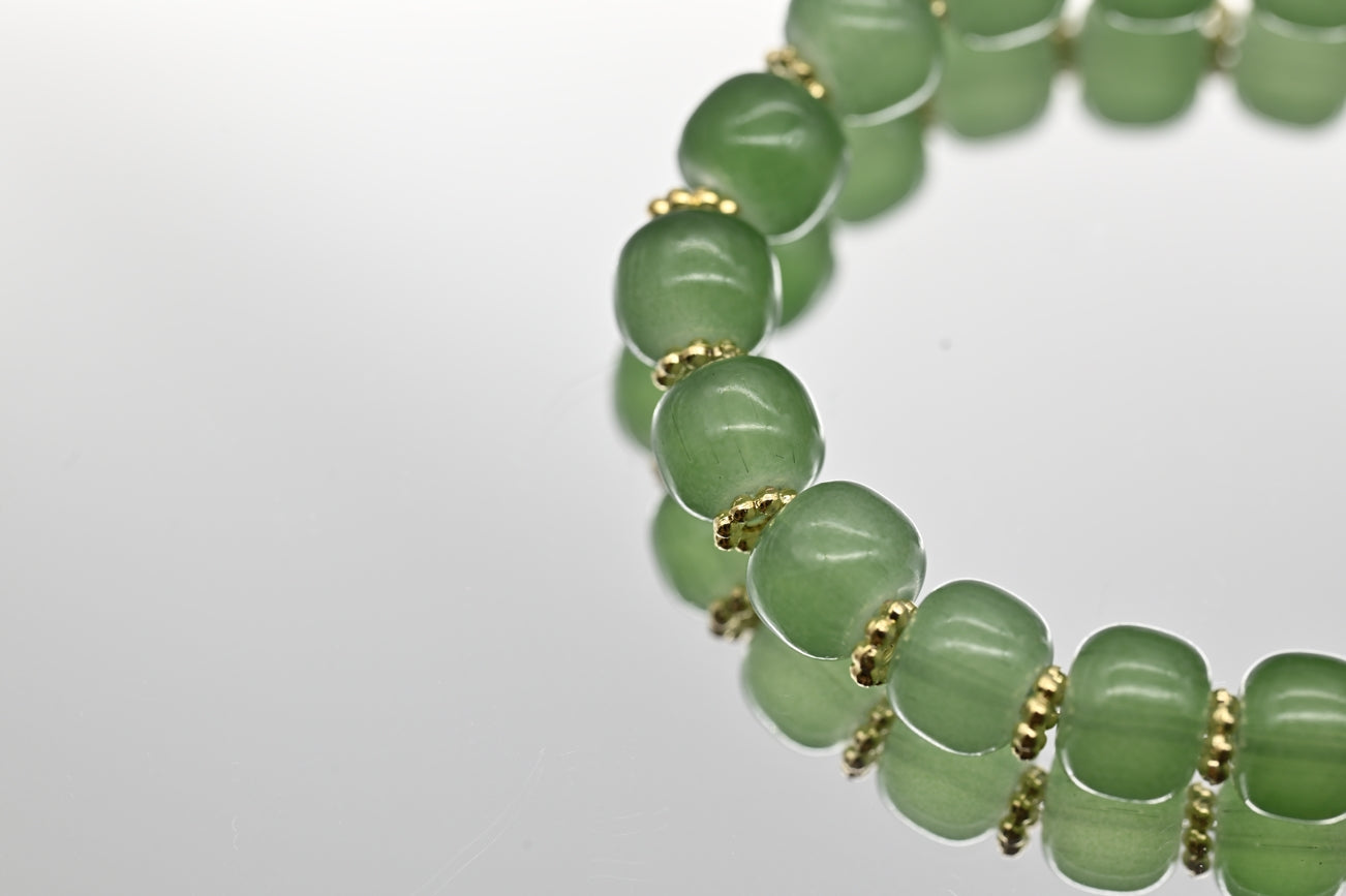 Green Beaded Bracelet with Butterfly Charm