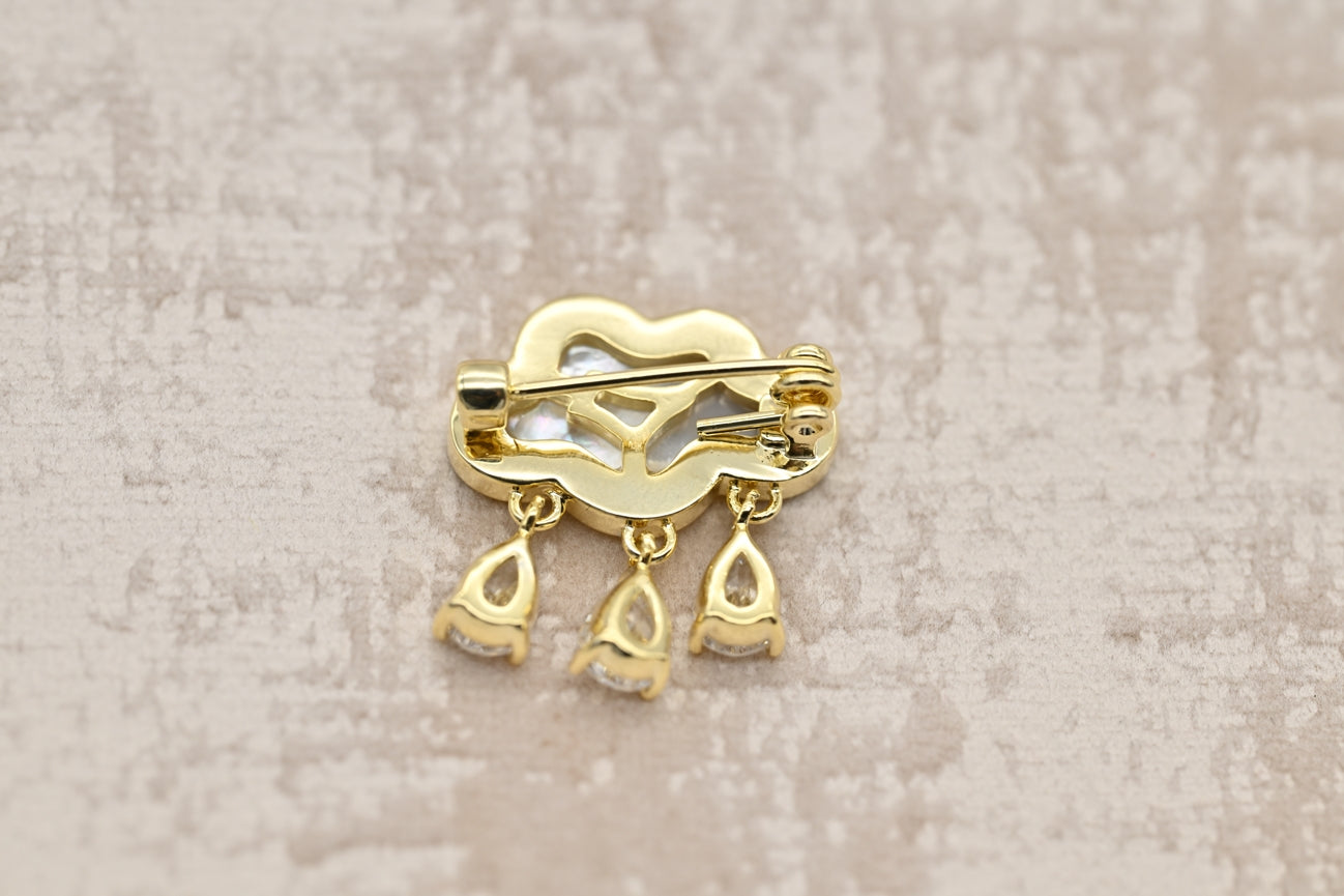 Elegant Cloud Brooch with Crystal Raindrops