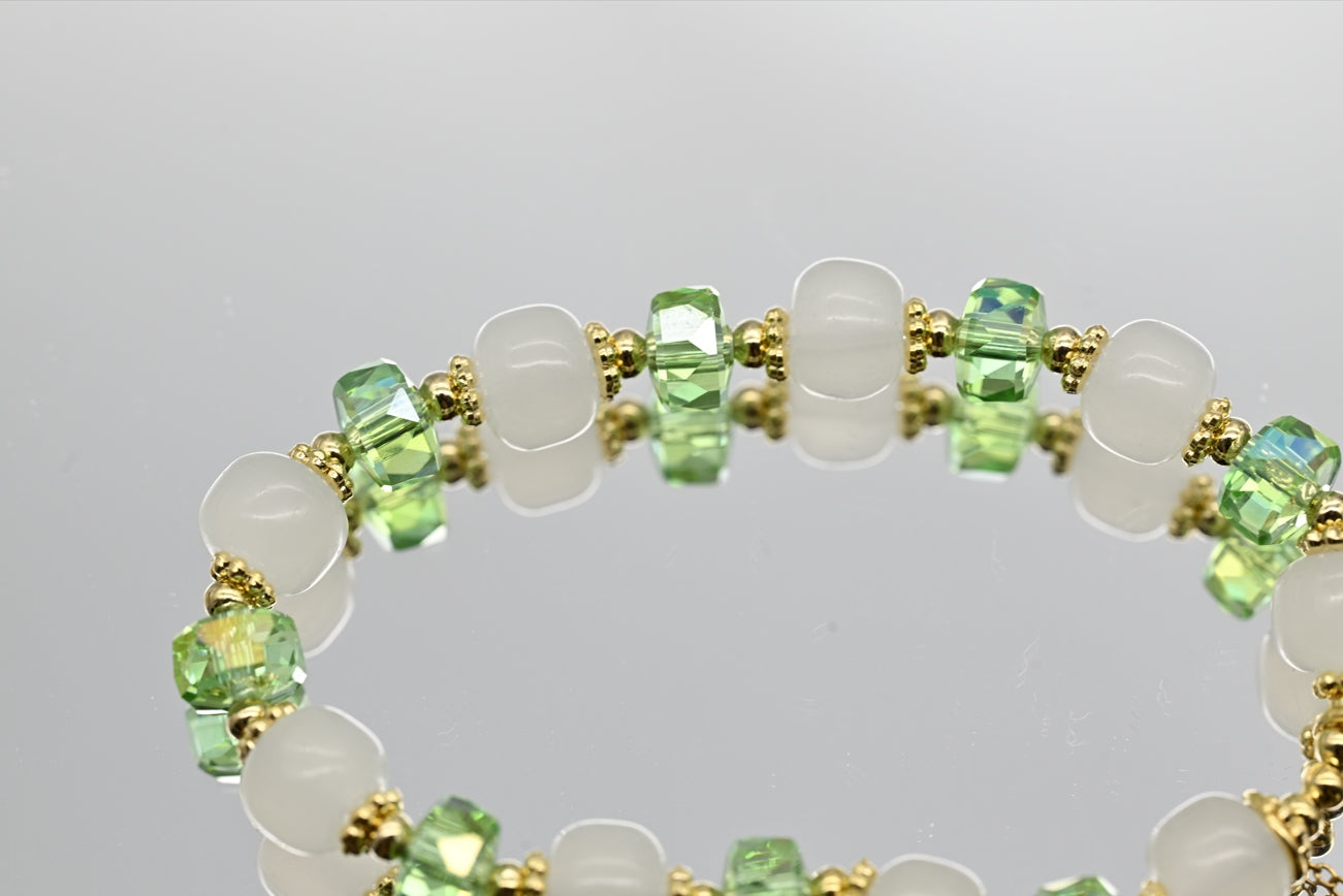 Green and White Beaded Bracelet with Gold Accents