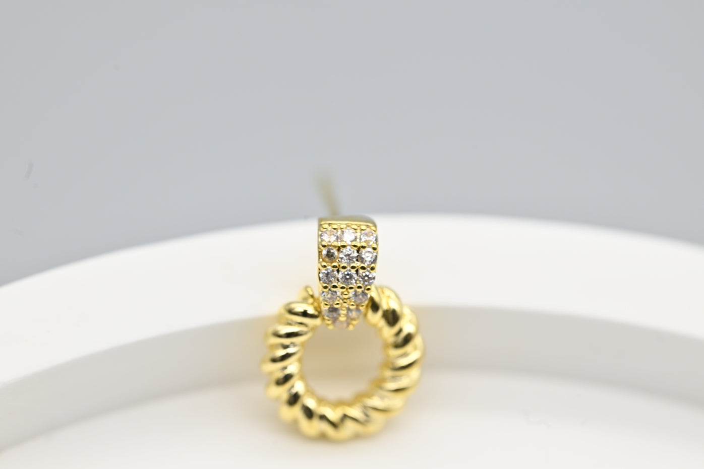 Chic Gold-Plated Twisted Hoop Earrings with Cubic Zirconia