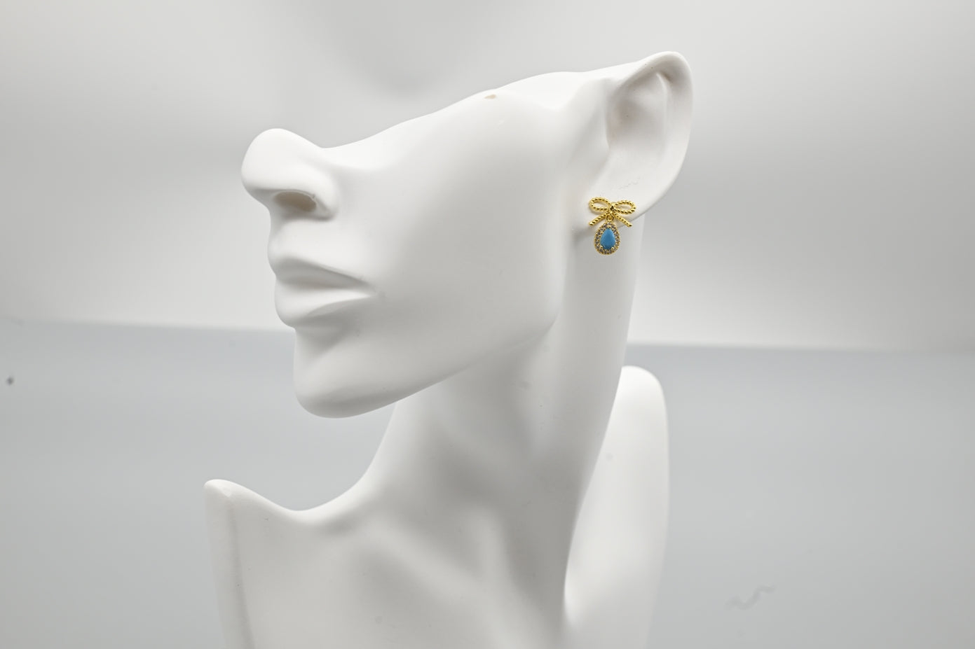 Charming Gold-Plated Bow and Turquoise Teardrop Earrings