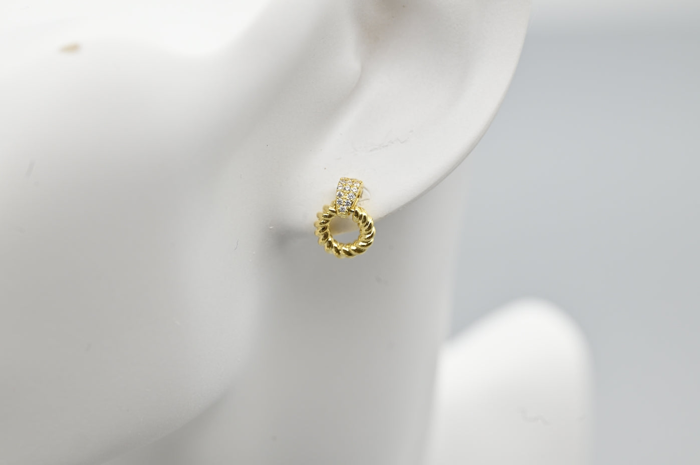 Chic Gold-Plated Twisted Hoop Earrings with Cubic Zirconia