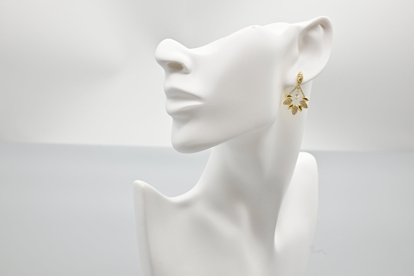 Stylish Gold-Plated Leaf Drop Earrings with Cubic Zirconia