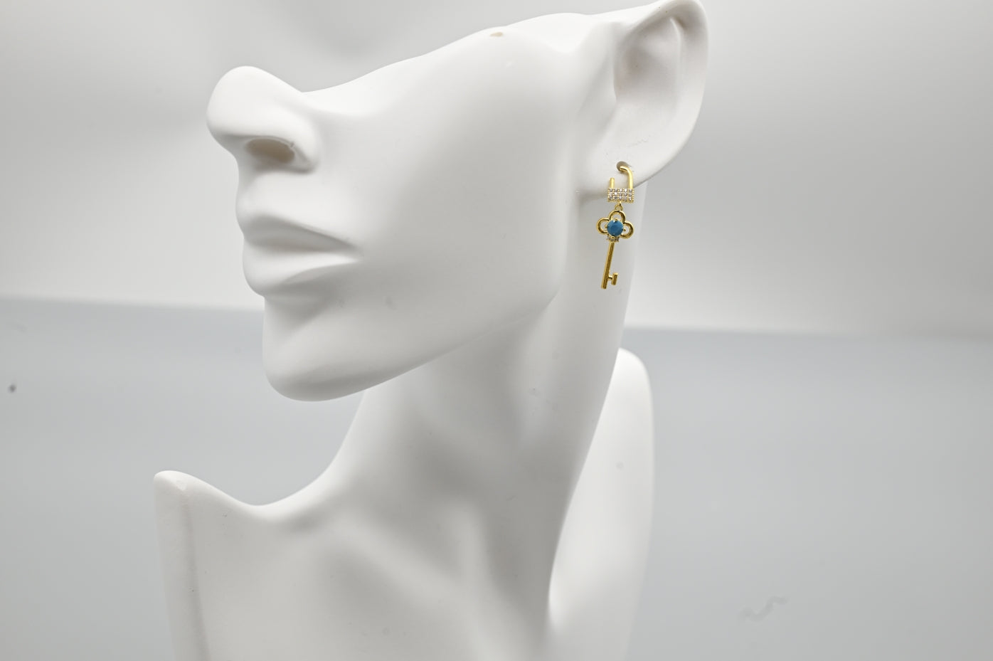 Charming Gold-Plated Key Drop Earrings with Turquoise Accents